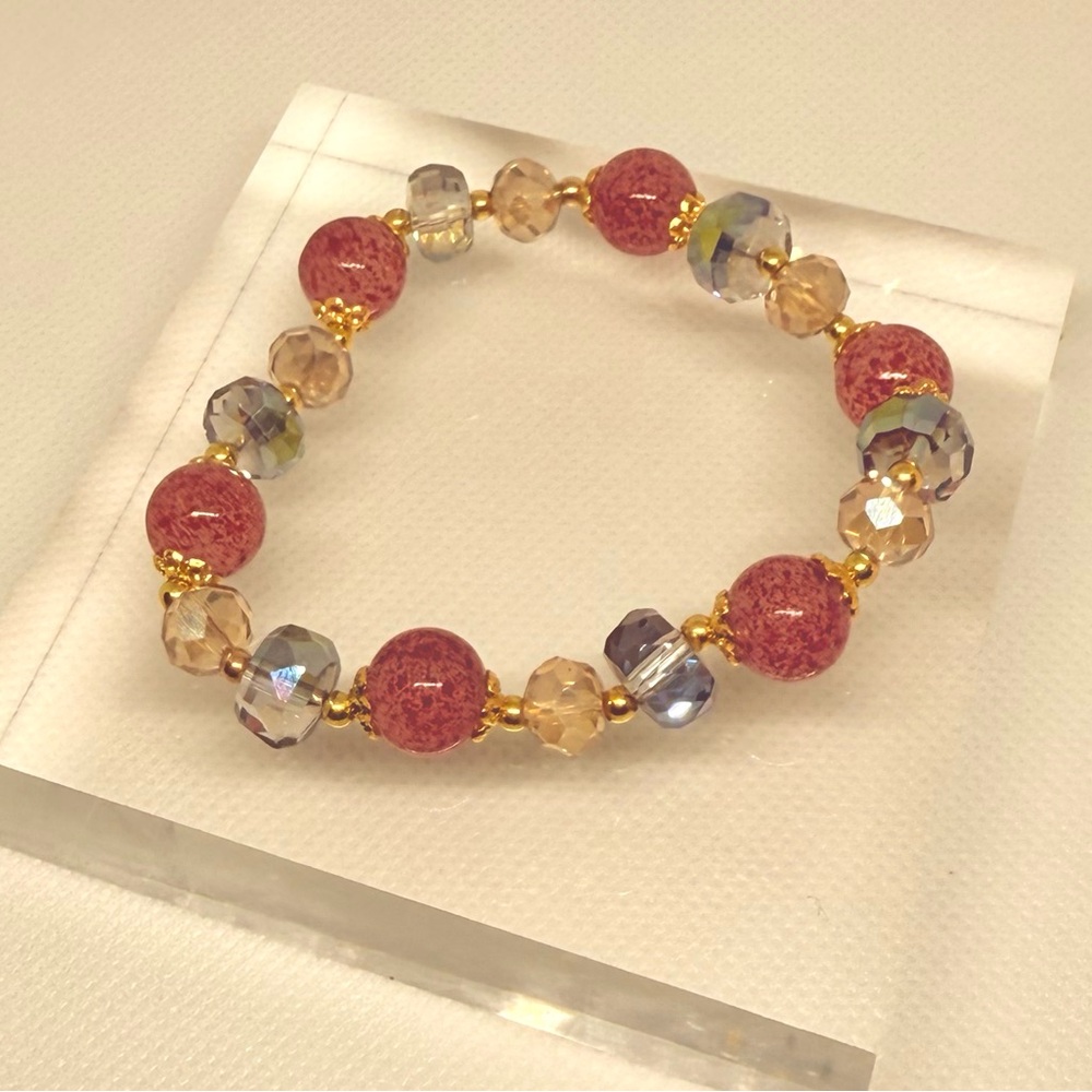 Gold and Pink Beaded Bracelet with Elegant Accents